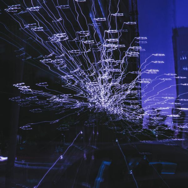 Blue neon energy flow lines abstract concept